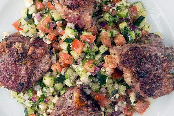 Herb Marinated Lamb Chops with Tomato-Cucumber Salad: A Recipe Inspired by Solid Gold