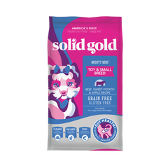 Purple and pink bag of Solid Gold Mighty Mini Beef Dry Food for toy and small dogs, featuring a cartoon dog design.
