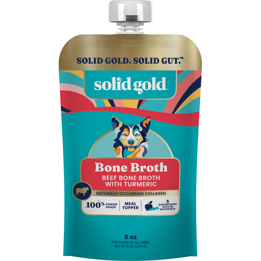 Pouch of beef bone broth for dogs, featuring a colorful design and a dog illustration on the front.
