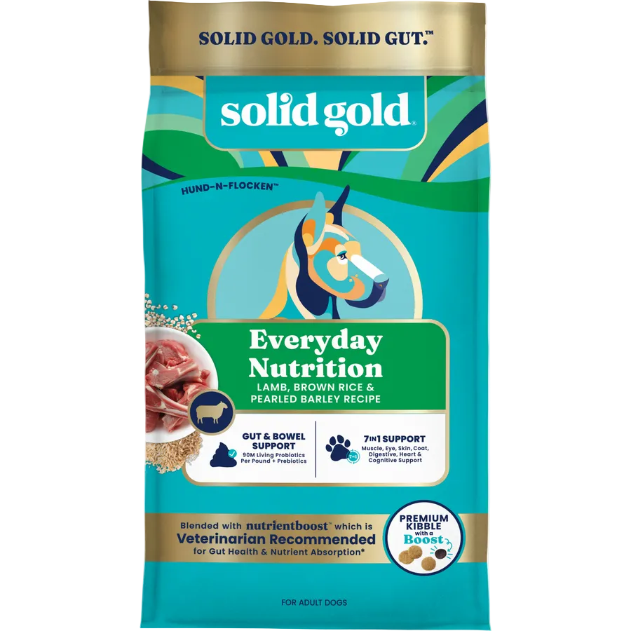 Dry dog food bag featuring lamb, brown rice, and pearled barley, with nutritional support claims and a colorful design.