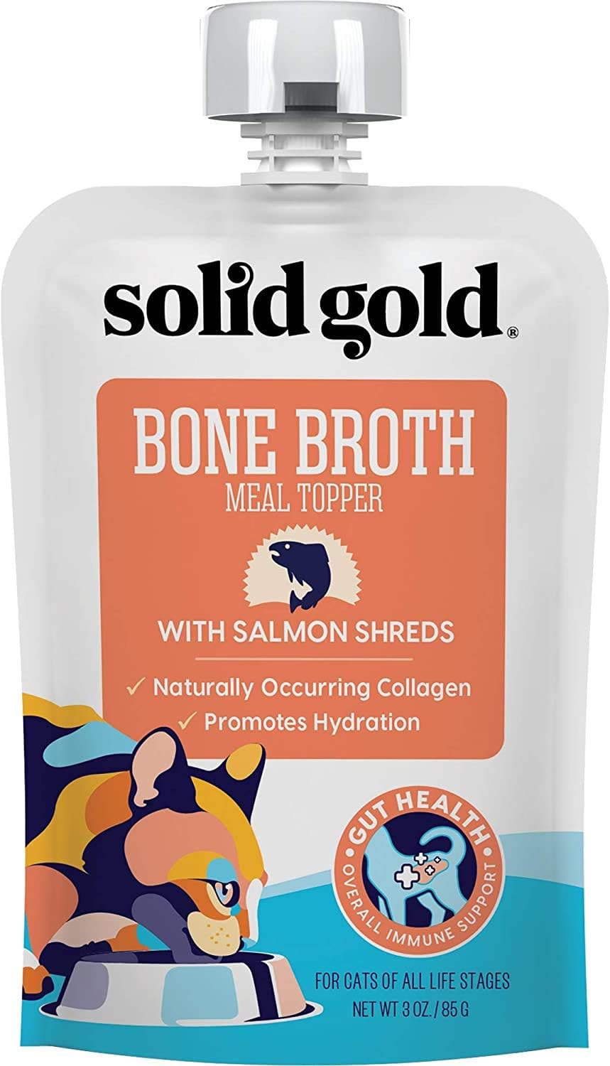 Pouch of bone broth meal topper for cats, featuring salmon shreds and colorful cat graphic on the front.