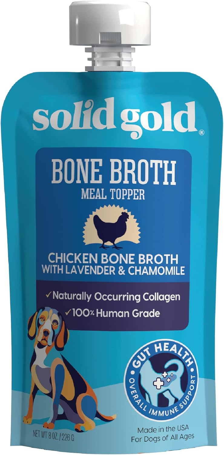 Pouch of chicken bone broth meal topper with lavender and chamomile for dogs, featuring a colorful dog illustration.