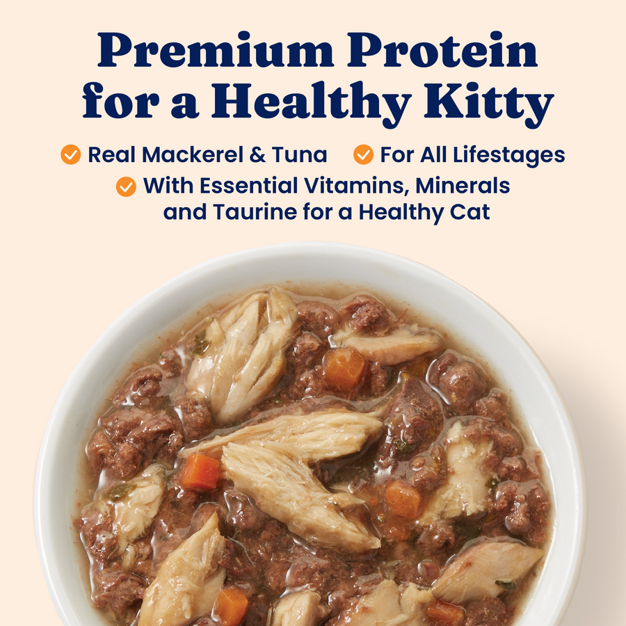 Wet cat food featuring chunks of mackerel and tuna in a gravy with visible vegetables.